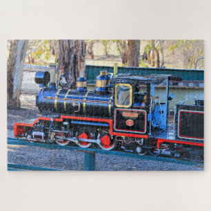 Miniature black steam train engine jigsaw puzzle