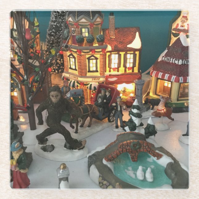 miniature Christmas village with Bigfoot Glass Coaster (Front)