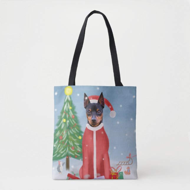 Miniature Pinsch Dog in Snow with Christmas Gifts  Tote Bag (Front)