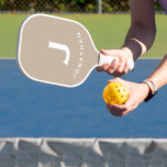 Minimal Beige Classic Monogram Pickleball Paddle<br><div class="desc">Masculine modern design features beige background with easy to use template for a single letter and name in stylish classic professional leterring. The design repeats on the reverse side. Perfect pickleball gift for him.</div>