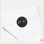 Minimal black white Monogram Script Wedding  Classic Round Sticker<br><div class="desc">Elevate your wedding details with the Minimalist Monogram Script Custom Wedding Date Sticker. This elegant and personalised sticker adds a touch of sophistication to your wedding stationery, allowing you to showcase your monogram and wedding date in a simple yet impactful way. White typography script on black. The sticker features a...</div>