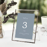 Minimal Leaf | Blue and White Wedding Table Number<br><div class="desc">This minimal leaf blue and white wedding table number is perfect for an elegant wedding. The design features a simple greenery silhouette in white on a dusty blue background with classic minimalist style. The card prints on the front and back (double-sided). Items are printed exactly as they appear on your...</div>
