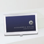Minimal Luxury Navy Blue Silver Monogram Business Card Holder<br><div class="desc">Minimalist monogram design with brushed metallic silver monogram medallion with personalized name and title or custom text below on a gradient background in shades of navy blue. Personalize for your custom use.</div>