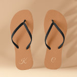 Minimal Modern Elegant Terracotta Simple Monogram Flip Flops<br><div class="desc">Elevate your style with these stylish and trendy Minimal Modern Elegant Terracotta Simple Monogram Flip Flops. These fashionable and personalised flip flops are designed for those who appreciate minimalistic beauty. The terracotta hue adds a touch of warmth, making them the perfect accessory for any season. Each pair of flip-flops is...</div>