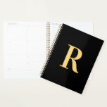 Minimal Modern Monogram Black Gold Planner<br><div class="desc">This is a simple, modern, personalised monogram design. This stylish design is in trending black and gold, with stylish typography. It's perfect for a personalised gift or ideal as a new planner for yourself. Simply add your initial letter by typing it into the personalise this text box. Check out the...</div>