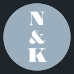 Minimal Modern Monogram Soft Blue Elegant Wedding Classic Round Sticker<br><div class="desc">This round wedding favor sticker features a clean monogram design with bold serif initials on a soft blue background for a timeless, modern look. Personalized with your initials, it’s an easy way to dress up favor bags, boxes, bottles, or envelopes. The simple, elegant layout pairs beautifully with modern, classic, and...</div>