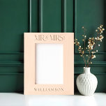 Minimal Mr & Mrs Newlyweds Wedding Gift Keepsake Etched Frames<br><div class="desc">Celebrate the union of two hearts with our Minimal Mr & Mrs. Newlyweds Wedding Gift Keepsake Etched Frame. Featuring sleek "MR & MRS" typography, this elegantly designed frame captures the essence of modern romance. Personalise it with the couple's last name and the year of their marriage, beautifully etched to create...</div>