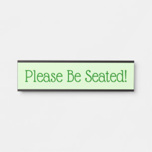 Minimalist and Humble "Please Be Seated!" Door Sign