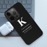 Minimalist Black and White Modern Monogram iPhone 15 Pro Case<br><div class="desc">A minimalist vertical design in an elegant style in monochrome black and white and large typographic initial monogram. The text can easily be customised for a design as unique as you are!</div>