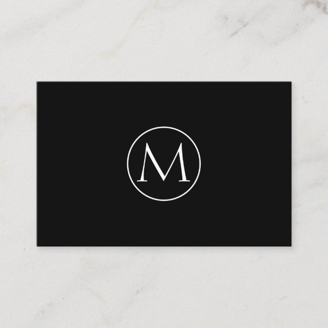 Minimalist black business card with monogram (Front)