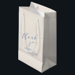 Minimalist Blue Script Bridal Shower Thank You Small Gift Bag<br><div class="desc">This personalized wedding favor gift bag features a soft champagne background with elegant blue script lettering for a timeless, refined look. The flowing handwritten “thank you” paired with classic typography creates a polished finish that works beautifully for bridal showers celebrations. Ideal for holding favors, small gifts, or welcome items for...</div>