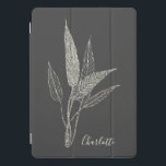 Minimalist Botanical Personalised Name Black White iPad Pro Cover<br><div class="desc">An elegant iPad case featuring a delicate botanical illustration in a fine line art style. The monochrome design against a dark background gives it a sophisticated and timeless appeal. Personalised with a custom name, this case is perfect for nature lovers, artists, writers, or anyone who appreciates modern minimalist aesthetics. A...</div>
