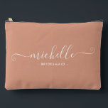 Minimalist Desert Coral Personalised Bridesmaid Accessory Pouch<br><div class="desc">Introducing our Chic Minimalist wine berry Personalised Bridesmaid Accessory Pouch, a stylish and versatile gift designed to celebrate your bridesmaids in elegance. This accessory pouch is the epitome of modern chic, perfect for any occasion from bridesmaid proposals to bridal showers. Crafted with a minimalist design, this pouch features a coral...</div>