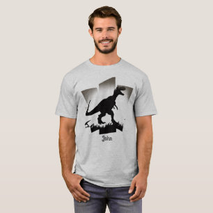 Minimalist dinosaur silhouette in grassy field  T-Shirt