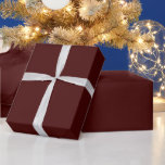 Minimalist Elegant Burgundy Christmas Colour  Wrapping Paper<br><div class="desc">Add a touch of sophistication to your holiday gifts with our Minimalist Elegant Burgundy Christmas Colour Wrapping Paper! Featuring a deep, rich burgundy hue, this wrapping paper exudes a timeless elegance perfect for the festive season. Its sleek, minimalist design makes it ideal for those who prefer understated beauty, allowing your...</div>