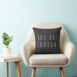 Minimalist Inspirational Quote Black White Text Cushion<br><div class="desc">A bold and empowering message in sleek minimalist typography: ‘You Are Enough.’ This modern black and white design is perfect for creating a calming, motivational space at home or in the office. Ideal for self-care advocates, wellness lovers, and those who appreciate daily affirmations. A thoughtful gift for friends, family, or...</div>