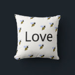 Minimalist "Love & Bees" Throw Pillow – Romantic<br><div class="desc">This elegant throw pillow features a minimalist design with the word "Love" at its centre, surrounded by a charming bee pattern. A perfect accent for any room, this pillow adds a warm and romantic touch to your home décor. Ideal as a gift for Valentine's Day, anniversaries, weddings, or simply as...</div>