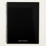 Minimalist Modern Solid Black Planner<br><div class="desc">Keep or delete the all caps name for him or her. 
Add a photo if you'd like. 
Create your own personalised design for her or him. 
Customise the solid black background colour.</div>