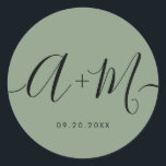 Minimalist Monogram Script Custom green Wedding Classic Round Sticker<br><div class="desc">Elevate your wedding details with the Minimalist Monogram Script Custom Wedding Date green Sticker. This elegant and personalized sticker adds a touch of sophistication to your wedding stationery, allowing you to showcase your monogram and wedding date in a simple yet impactful way. The sticker features a minimalist script design that...</div>