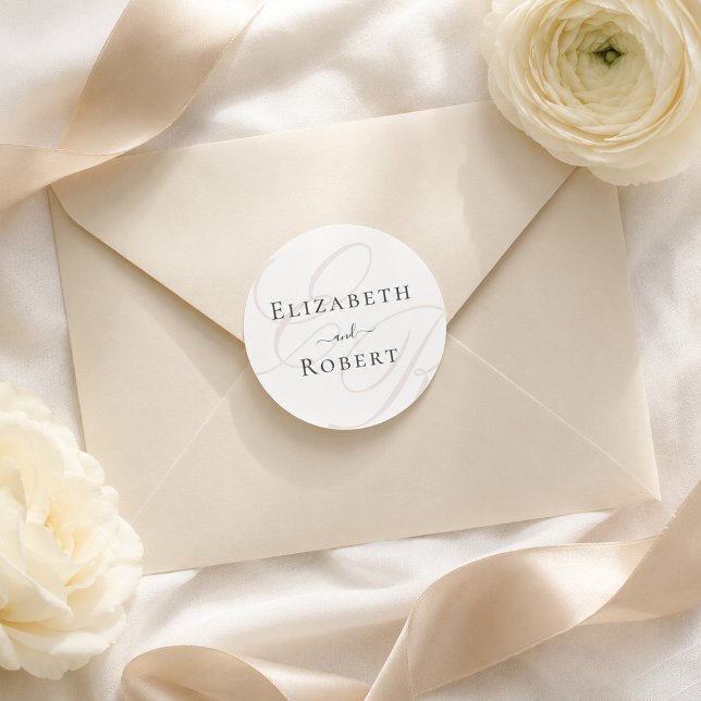 Minimalist Monogram Wedding Round Sticker (Minimalist Monogram Wedding Round Sticker on an elegant envelope next to white flowers)