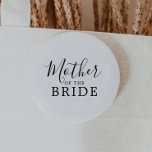 Minimalist Mother of the Bride Bridal Shower 6 Cm Round Badge<br><div class="desc">This minimalist mother of the bride bridal shower button is perfect for a simple wedding shower. The modern romantic design features classic black and white typography paired with a rustic yet elegant calligraphy with vintage hand lettered style. Customisable in any colour. Keep the design simple and elegant, as is, or...</div>