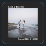 Minimalist Photo Black Love & Thanks Wedding Square Sticker<br><div class="desc">These stickers are perfect for wedding thank you gifts or favours, or as an addition to your invitation mailing. They feature a simple minimalist design with your square photo on a black background. The left justified caption atop the photo reads "Love and Thanks", while the couple's names below are right...</div>