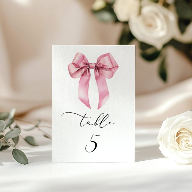 Minimalist pink bow Script table number (Creator Uploaded)
