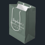 Minimalist Sage Green and White Bridal Shower      Medium Gift Bag<br><div class="desc">The Sage Green and White Bridal Shower Gift Bag brings a touch of elegance with its soft sage green colour and clean white text. This minimalist design keeps it simple yet stylish, making it a perfect choice for presenting gifts at a bridal shower. The understated aesthetic allows the message to...</div>