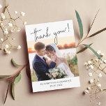 Minimalist Simple elegant script 2 Photo Wedding Thank You Card<br><div class="desc">Thank your guests and show your gratitude with this modern, elegant, and minimalist 2 sided photo thank you card, that features a hand-lettered typography script that reads "Thank you!" just above the front picture. Easily customisable by adding two of your favourite wedding pictures (one on each side of the card),...</div>