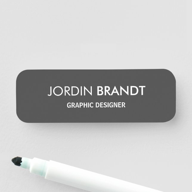 Minimalist simple grey business name tag (In Situ)