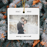 Minimalist Typewriter | Merry and Married Photo Ceramic Ornament<br><div class="desc">These simple and minimalist Christmas holiday ornaments feature your favorite wedding photo on the front along with your initials, the year, and the words "merry and married" in black typewriter look text. The back features another of your wedding photos, lightened with an overlay so that you can add additional text...</div>