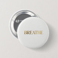 Minimalist typography with gold word breathe
