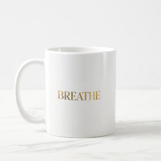 Minimalist typography with gold word breathe coffee mug (Left)