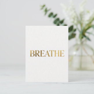 Minimalist typography with gold word breathe postcard