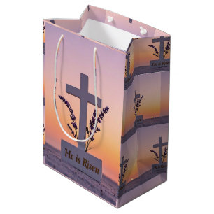 Minimalist white cross adorned with lavender medium gift bag