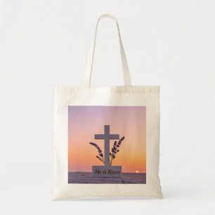 Minimalist white cross adorned with lavender tote bag