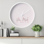 Minimalistic Monogram Initial & Name Pastel Pink  Clock<br><div class="desc">Add a touch of elegance to your space with our Minimalistic Monogram Personalised Pastel Pink Initial & Name Wall Clock. Featuring a sophisticated pastel pink design with a customisable monogram and name, this chic wall clock combines style and functionality. Made from high-quality materials, it offers precise timekeeping with a sleek,...</div>