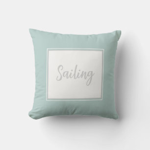 Mint Green Throw Pillow with text 'Sailing'