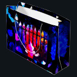 Miraculous Menorah Large Gift Bag<br><div class="desc">Mysterious lights and miraculous colour in the deepest shades of nightfall—this is the moment of Hanukkah! Your gifts will light up some big smiles with this colourful bag!</div>