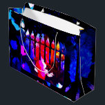 Miraculous Menorah Large Gift Bag<br><div class="desc">Mysterious lights and miraculous colour in the deepest shades of nightfall—this is the moment of Hanukkah! Your gifts will light up some big smiles with this colourful bag!</div>