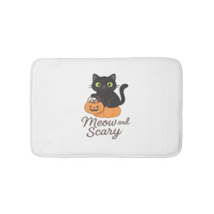 Mischievous Black Cat with Glowing Green Eyes on P Bath Mat