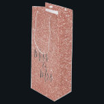 Miss to Mrs Bridal Shower Party Rose Gold Sparkle Wine Gift Bag<br><div class="desc">From Miss to Mrs Bridal Shower or Bachelorette Party Pink Rose Gold Sparkle and Faux Glitter Cute Gift Wine Bag. The From Miss to Mrs. Bachelorette Party Gift Box uses the popular rose gold background and grey typography.</div>