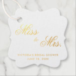 Miss To Mrs Elegant Gold Foil Bridal Shower Favour Tags<br><div class="desc">Elegant typography bridal shower favour tags featuring the words, "Miss to Mrs" in calligraphy and your name, event title and date below, . All design elements are in real gold foil over a white background. These stylish and chic tags are a great way to add a classy touch to your...</div>