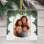 Mistletoe Foliage Rounded Frame 2 Photos Christmas Ceramic Ornament<br><div class="desc">This charming Christmas ornament showcases a vertical photo within a rounded frame,  accented with a mistletoe border on the front. The backside offers space for an additional photo.</div>