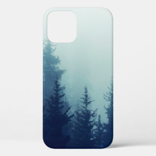 Misty fog in pine forest on mountain slopes. Colou iPhone 12 Case