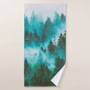Misty foggy mountain landscape with fir forest and bath towel
