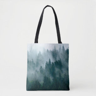 Misty landscape with fir forest in hipster vintage tote bag