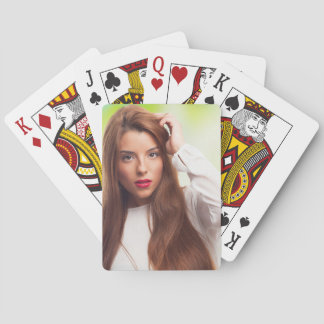 Mobile webpage shows a fan of playing cards