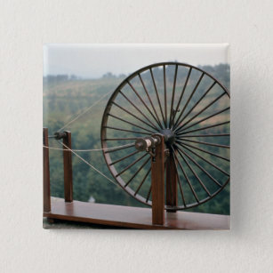 Model of a spinning machine 15 cm square badge