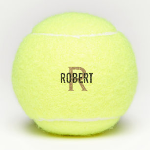 Moder black gold monogrammed  tennis balls